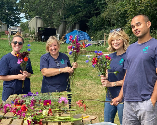 People arranging flowers