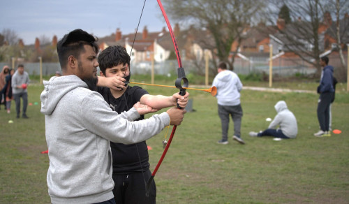 Child playing archery