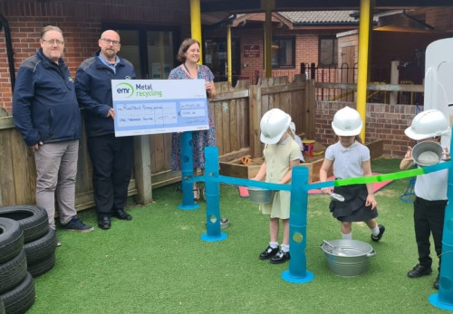 Redstart Primary School receiving donation
