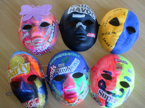 Painted masks on a table