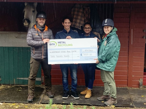 Wormwood Scrubs Pony Centre receiving donation